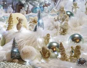 Frosted blue and white ornaments and miniature trees
