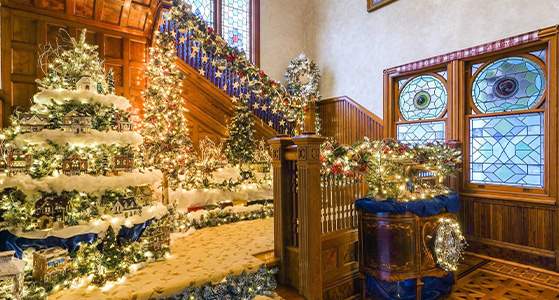 The mansion staircase dressed for the Christmas Spectacular