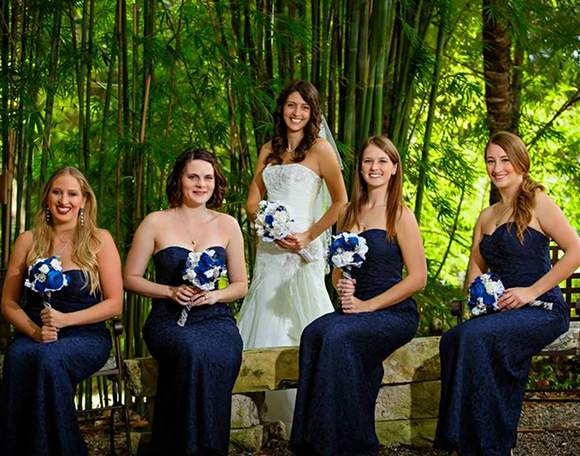 The bride and her bridesmaids in the garden